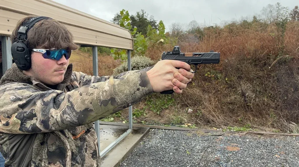 Optics-ready pistol photographed for a gear evaluation